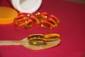 Cod liver fish oil omega 3 gel capsules on red background. Healthcare concept