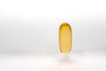 Cod liver oil capsule ,fish oil ,food supliment with omega 3 ,heart care . on a white background Royalty Free Stock Photo