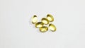 Cod liver oil or fish oil gel capsule on white background. Royalty Free Stock Photo
