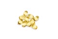 Cod liver oil omega 3 gel capsules or pils isolated on a white background. A group of transparent fish oil tablets.