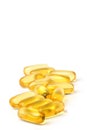 Cod liver oil tablets on a white background Royalty Free Stock Photo