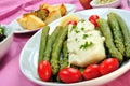 Cod loins with green asparagus and tomato Royalty Free Stock Photo