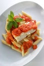 cod loins with home made tomato sauce Royalty Free Stock Photo