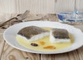 Cod with Pil Pil Sauce, Basque cookery. Royalty Free Stock Photo