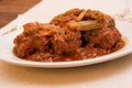 Coda alla Vaccinara meat tail dish specialty from lazio region and Roma area called coda alla vaccinara Royalty Free Stock Photo