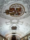 Code of Arms with intricate framing designs on the ceiling of the Rosenborg Castle