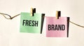 Code of conduct text words FRESH BRAND on yellow sticker note on white wall or table Royalty Free Stock Photo
