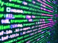 Code on dark background. Concept screen of experienced web developer. Letters, chars, and digits. Programmer developer screen. Royalty Free Stock Photo