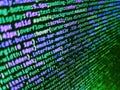 Code on dark background. Developer working on program codes in office. Javascript code in bracket software. Web or application Royalty Free Stock Photo