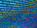 Code on dark background. Software technology background showing programming source code on computer screen. Programmer occupation Royalty Free Stock Photo