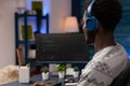 It code developer wearing headset programming codes for firewall server Royalty Free Stock Photo