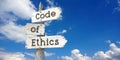 Code of ethics - wooden signpost with three arrows Royalty Free Stock Photo