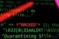 Code line with word hacked on it. Hacker concept. Hacking online concept