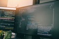 Coder programmers working in office, Programmer analyst writing code - coding program on screen computer for learning and Royalty Free Stock Photo