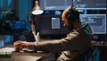 IT coder taking supplements out of box in office Royalty Free Stock Photo