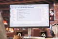 Coder at workstation programming on computer, writing lines of code, close up Royalty Free Stock Photo