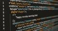 Coding Display Shows Programming Language on Screen Royalty Free Stock Photo