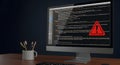 Coding Error Alert: Computer Screen with Warning Symbol Royalty Free Stock Photo
