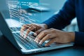 Coding on laptop for software development and programming with code overlay for developers and technology Royalty Free Stock Photo