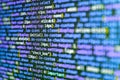 IT coding on monitor screen. Abstract technological background with digits and lines. Computer science lesson. Letters, chars, and Royalty Free Stock Photo