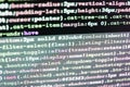 IT coding on monitor screen. Big data database app. HTML markup language closeup.