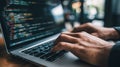 Coding programmer software development computer laptop keyboard code technology hands type intense focus on screen in modern Royalty Free Stock Photo