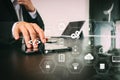 businessman working with smart phone and digital tablet and laptop computer in modern office with glass reflected view Royalty Free Stock Photo