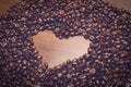 Coffe beans on the table in the morning with heart shape inside Royalty Free Stock Photo