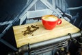 Coffe Cup with Beans on Plate Royalty Free Stock Photo