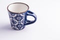 Coffe cup empty made of finely decorated blue and white china Royalty Free Stock Photo