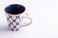 Coffe cup empty made of finely decorated blue and white china Royalty Free Stock Photo