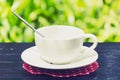 Coffe cup in the Garden. Royalty Free Stock Photo