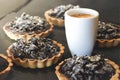 Coffe cup wits delicious chocolate tarts