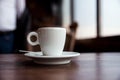 Coffe Cup on the Wooden Table in the Caffee Bar Royalty Free Stock Photo