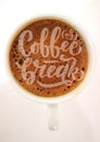 Lettering `coffee break` with coffee cup as background.