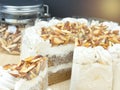 Coffee almond cake on wood table,selective focus