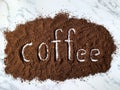 Coffee alphabet made from roasted and ground coffee beans isolated on white background Royalty Free Stock Photo