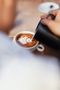 Coffee Art In Cup. Closeup Of Hands Making Latte Art Royalty Free Stock Photo