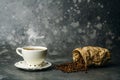 Coffee background. Coffee beans and cup on dark backgrpund. Coffee banner for menu, design and decoration