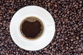 Coffee background with beans and white cup. copy space. Royalty Free Stock Photo