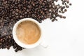 Coffee background with beans and white cup. copy space. Royalty Free Stock Photo