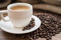 Coffee bag and heart from coffee beans on table Royalty Free Stock Photo