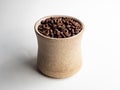 Coffee bean closeup in a mug