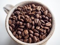 Coffee bean closeup in a mug