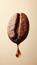 Coffee bean with drop of coffee liquid on gradient background. Coffee bean oozes coffee drop. Isolated brown coffee bean on beige Royalty Free Stock Photo