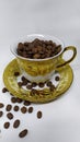 Coffee bean golden tea cup