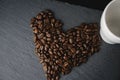 Coffee bean love shape on a slate Royalty Free Stock Photo