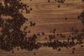 Coffee Beans on Zebrano wood table Royalty Free Stock Photo