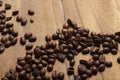 Coffee Beans on Zebrano wood table Royalty Free Stock Photo