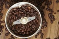 Coffee Beans and grinder on Zebrano wood table top